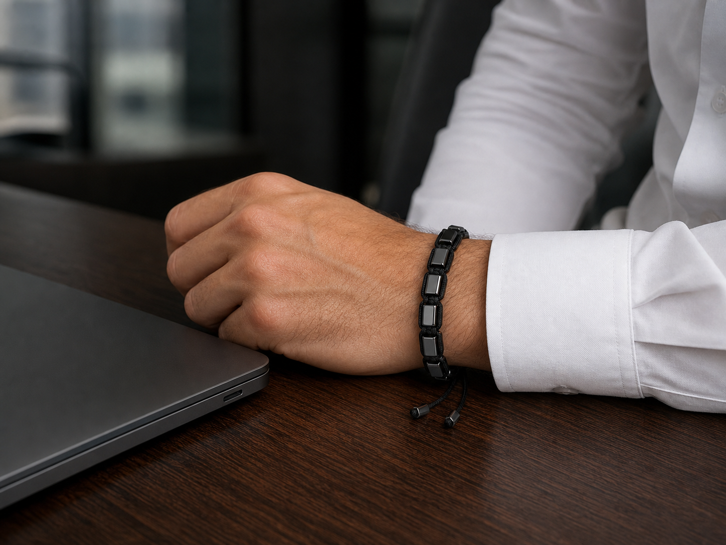 Hematiteforce bracelet worn with a tailored shirt